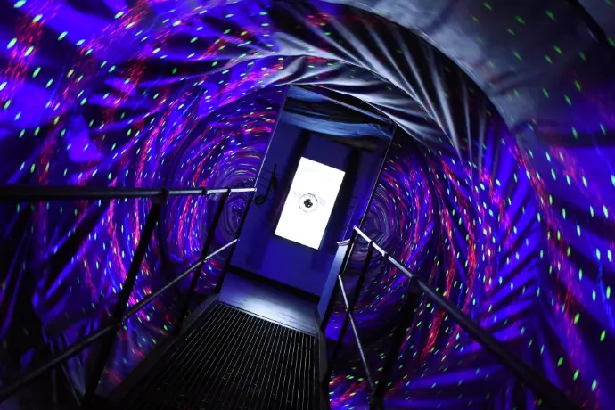 Image showing a spiral tunnel with an eyeball at the end to signify the twilight zone